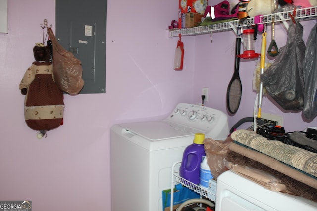 239 Ferguson Ave, Locust Grove, GA 30248 - washroom featuring electric panel and separate washer and dryer