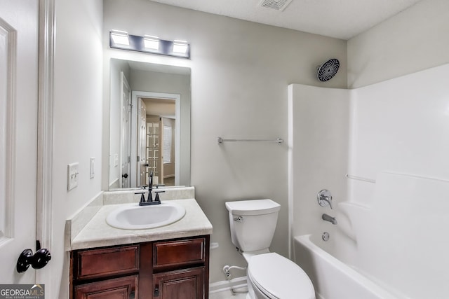 365 Othello Dr, Hampton, GA 30228 - full bathroom featuring toilet, vanity, shower / washtub combination, and baseboards