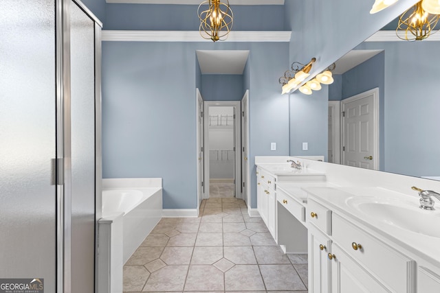 125 Lake Park Dr, Sharpsburg, GA 30277 - bathroom with a bath, double vanity, tile patterned flooring, baseboards, and a shower with door