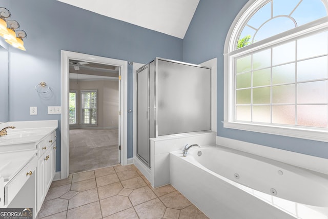 125 Lake Park Dr, Sharpsburg, GA 30277 - full bath featuring a whirlpool tub, a stall shower, vanity, lofted ceiling, and tile patterned flooring
