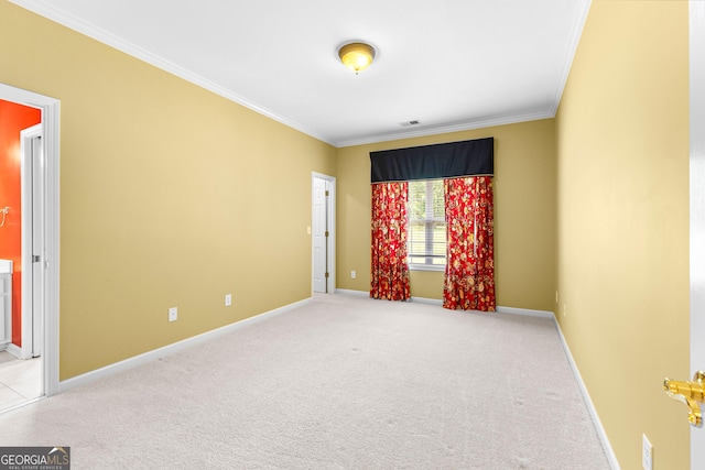 125 Lake Park Dr, Sharpsburg, GA 30277 - spare room featuring crown molding, light colored carpet, and baseboards