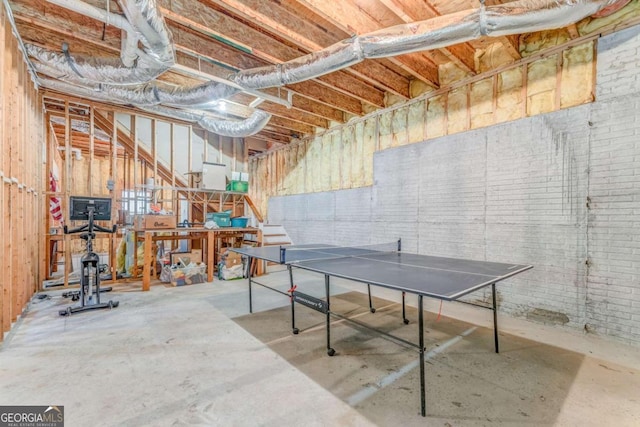 211 Westwood Dr, Calhoun, GA 30701 - unfinished below grade area featuring brick wall