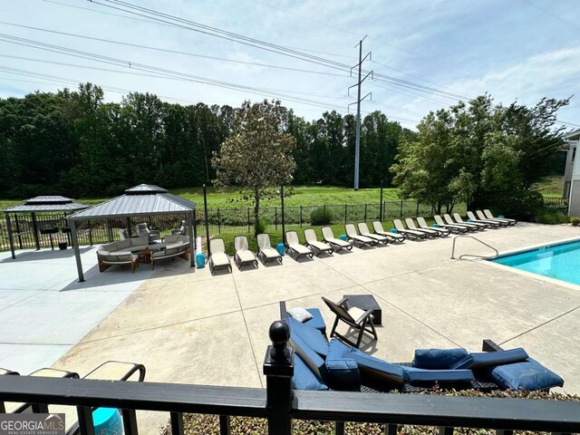 1503 Wingate Way Unit 1503, Sandy Springs, GA 30350 - community pool featuring a gazebo and a patio