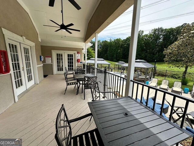 1503 Wingate Way Unit 1503, Sandy Springs, GA 30350 - deck with french doors, outdoor dining area, a gazebo, and a ceiling fan