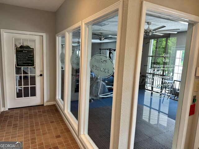 1503 Wingate Way Unit 1503, Sandy Springs, GA 30350 - doorway to outside with ceiling fan