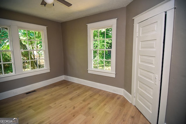 109 C St SE, Thomaston, GA 30286 - empty room with ceiling fan and light wood-type flooring