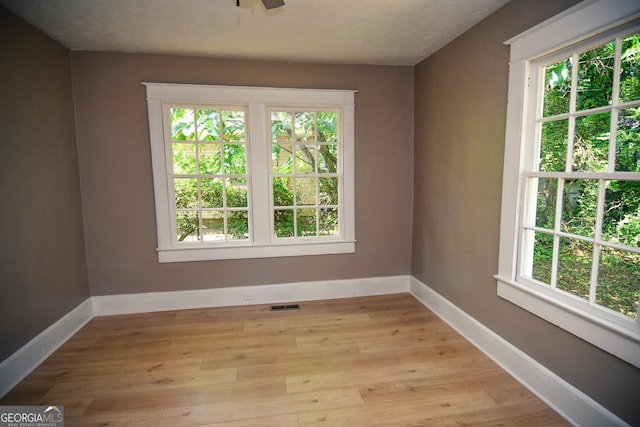 109 C St SE, Thomaston, GA 30286 - spare room with light wood-style floors and ceiling fan