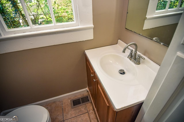 109 C St SE, Thomaston, GA 30286 - half bathroom featuring vanity and plenty of natural light
