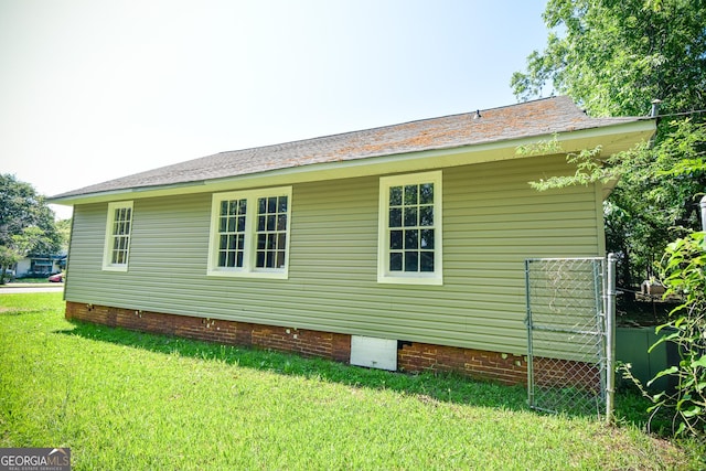 109 C St SE, Thomaston, GA 30286 - view of side of property with crawl space and a yard