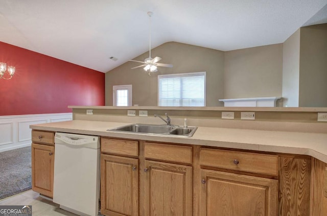 580 Camry Cir, Dallas, GA 30157 - kitchen with white dishwasher, a sink, lofted ceiling, light countertops, and wainscoting