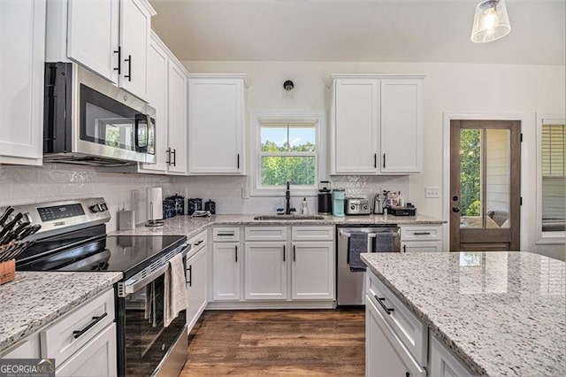 461 Barnwood, Rockmart, GA 30153 - kitchen with appliances with stainless steel finishes, a sink, plenty of natural light, and white cabinetry