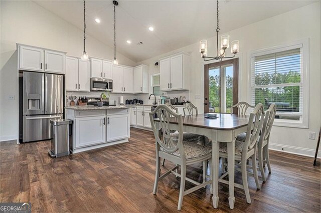 461 Barnwood, Rockmart, GA 30153 - dining space featuring a chandelier, lofted ceiling, dark wood-type flooring, baseboards, and recessed lighting