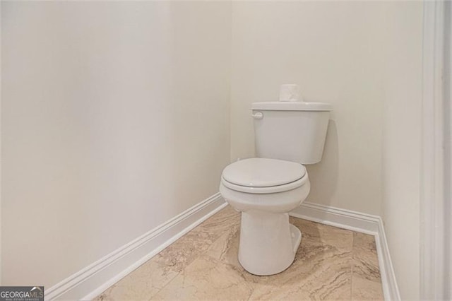 461 Barnwood, Rockmart, GA 30153 - bathroom with baseboards, toilet, and marble finish flooring