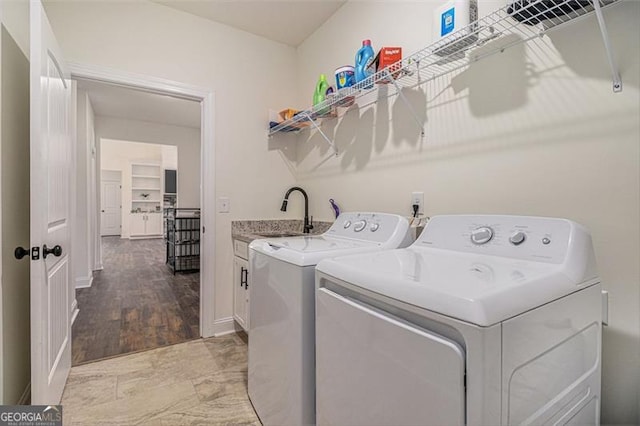 461 Barnwood, Rockmart, GA 30153 - washroom featuring washing machine and dryer, cabinet space, and baseboards