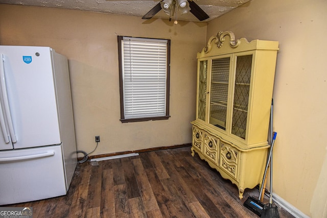 246 Shiloh Rd, Jenkinsburg, GA 30234 - unfurnished dining area with a ceiling fan, wood finished floors, and baseboards