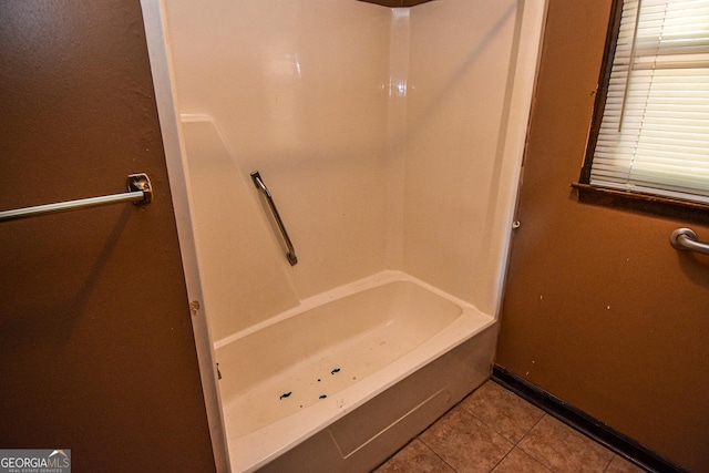 246 Shiloh Rd, Jenkinsburg, GA 30234 - bathroom with tile patterned floors, bathing tub / shower combination, and baseboards