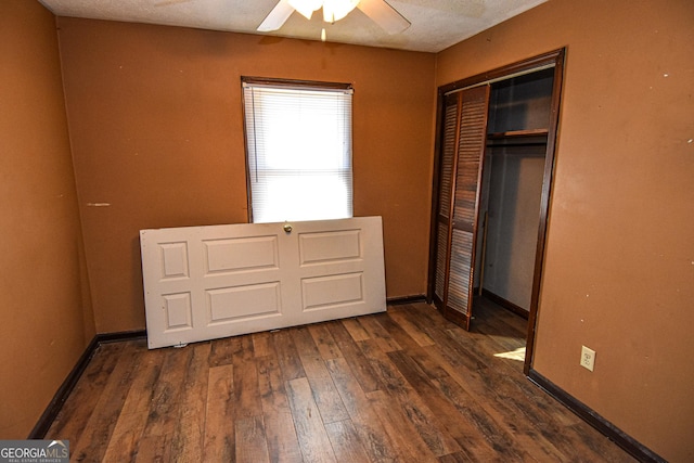 246 Shiloh Rd, Jenkinsburg, GA 30234 - unfurnished bedroom featuring hardwood / wood-style flooring, a closet, ceiling fan, and baseboards