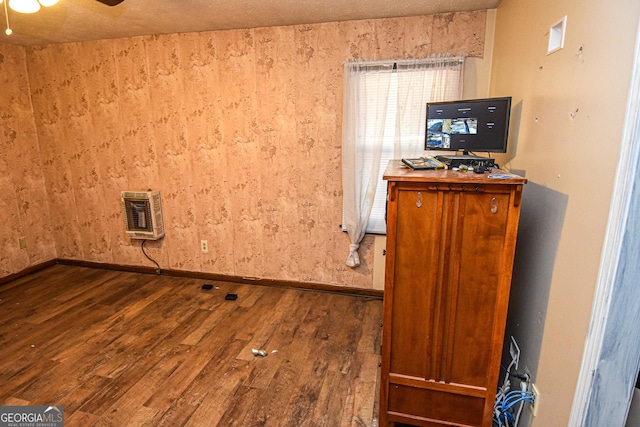 246 Shiloh Rd, Jenkinsburg, GA 30234 - laundry room with heating unit, wood finished floors, baseboards, and a ceiling fan