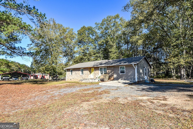 246 Shiloh Rd, Jenkinsburg, GA 30234 - ranch-style house with a carport
