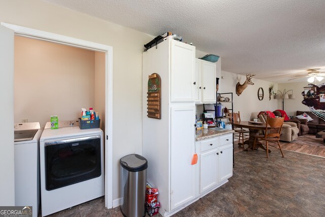 35 Good Hope Rd, Colbert, GA 30628 - washroom with washer and clothes dryer, a textured ceiling, and ceiling fan