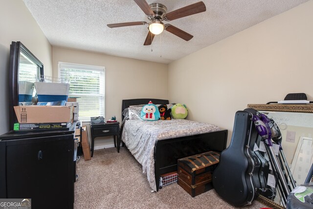 35 Good Hope Rd, Colbert, GA 30628 - carpeted bedroom featuring a textured ceiling and a ceiling fan
