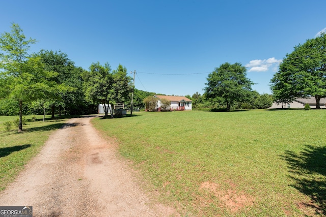 35 Good Hope Rd, Colbert, GA 30628 - view of front facade featuring driveway and a front lawn
