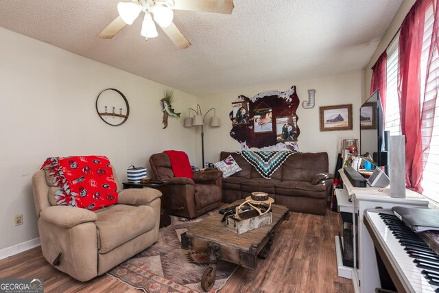 35 Good Hope Rd, Colbert, GA 30628 - living room with ceiling fan, wood finished floors, a textured ceiling, and baseboards