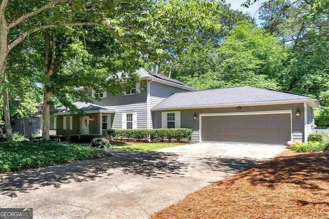 3544 Chestatee Dr, Marietta, GA 30062 - view of front of home with asphalt driveway and an attached garage