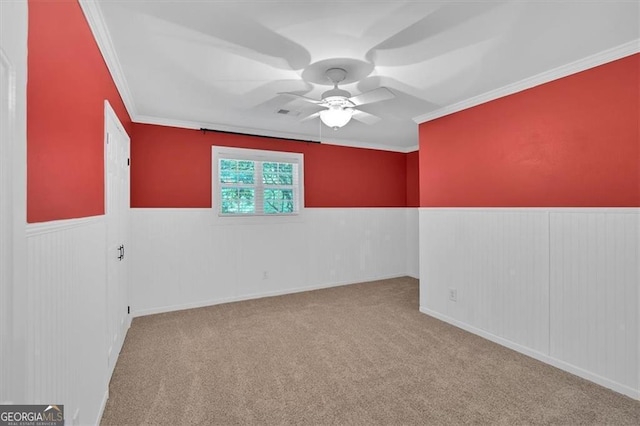3544 Chestatee Dr, Marietta, GA 30062 - carpeted spare room featuring ornamental molding, ceiling fan, and a wainscoted wall