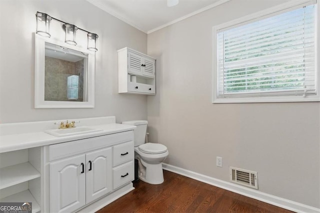 3544 Chestatee Dr, Marietta, GA 30062 - full bath featuring crown molding, baseboards, wood finished floors, toilet, and vanity