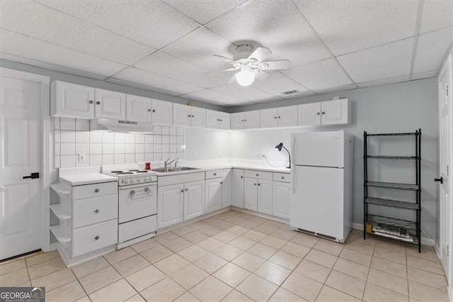 3544 Chestatee Dr, Marietta, GA 30062 - kitchen featuring white appliances, under cabinet range hood, a sink, a ceiling fan, and white cabinetry