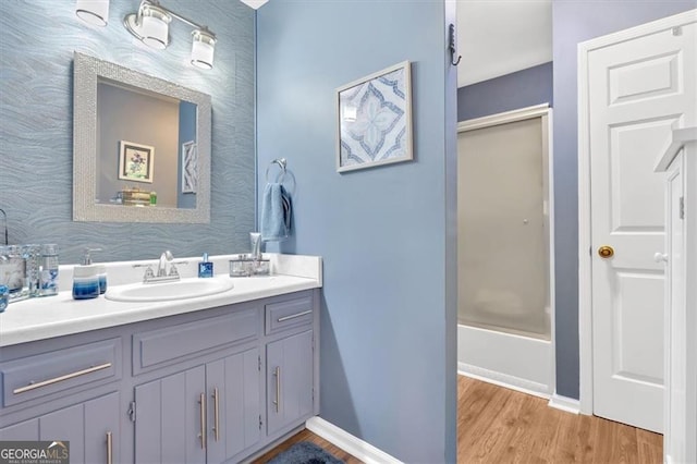 3544 Chestatee Dr, Marietta, GA 30062 - bathroom with vanity, wood finished floors, and baseboards