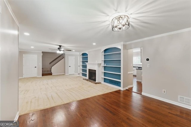 3544 Chestatee Dr, Marietta, GA 30062 - unfurnished living room featuring ornamental molding, baseboards, a fireplace with raised hearth, recessed lighting, and ceiling fan