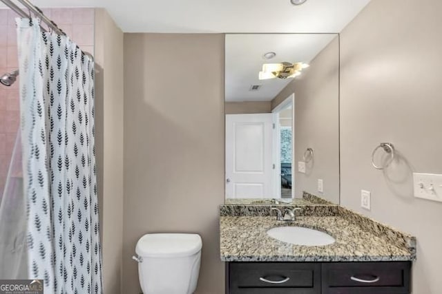 3338 Peachtree Rd NE Unit 508, Atlanta, GA 30326 - bathroom with vanity and a shower with shower curtain