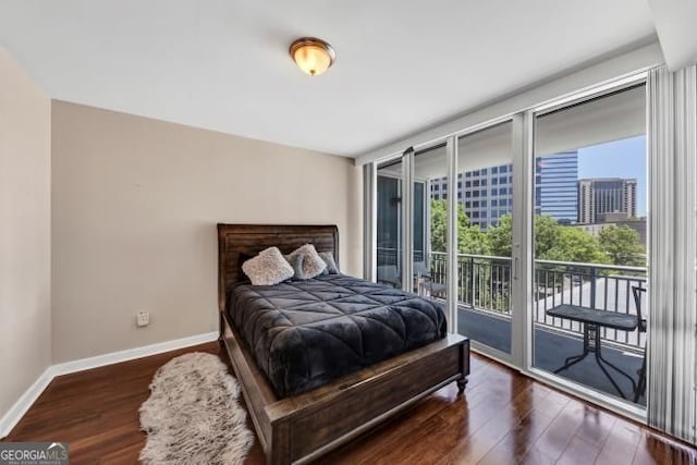 3338 Peachtree Rd NE Unit 508, Atlanta, GA 30326 - bedroom featuring wood finished floors, access to outside, and baseboards