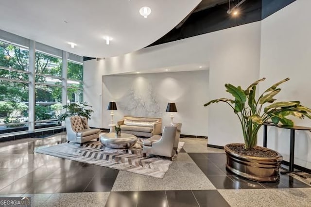 3338 Peachtree Rd NE Unit 508, Atlanta, GA 30326 - common area featuring a high ceiling and expansive windows