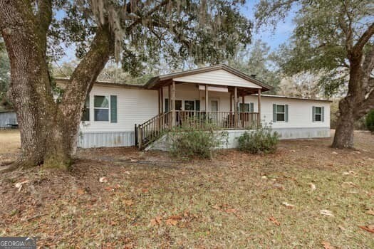 4369 River Rd, Folkston, GA 31537 - manufactured / mobile home with covered porch