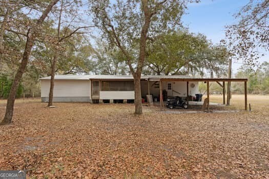 4369 River Rd, Folkston, GA 31537 - back of property featuring a carport