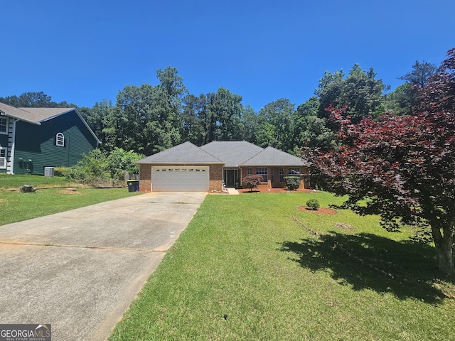 212 Hunting Ct, Jonesboro, GA 30236 - ranch-style home with an attached garage, concrete driveway, a front yard, and brick siding