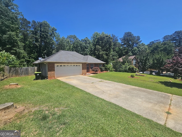 212 Hunting Ct, Jonesboro, GA 30236 - view of front facade featuring a garage, driveway, and brick siding