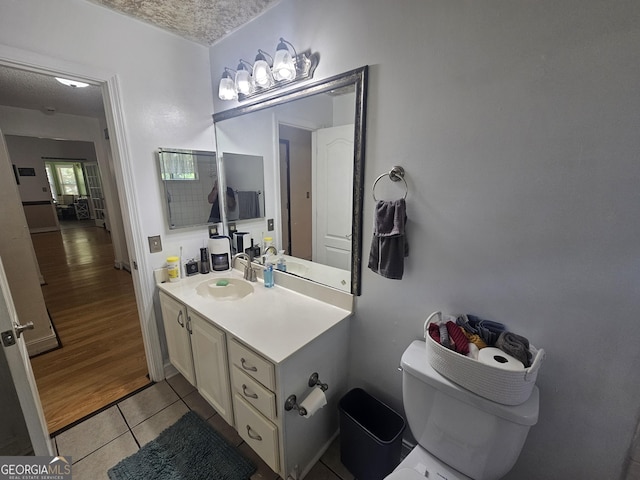 212 Hunting Ct, Jonesboro, GA 30236 - bathroom with vanity, toilet, and tile patterned floors