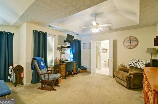 809 Longbranch Ln, Douglasville, GA 30134 - sitting room featuring a tray ceiling, carpet floors, ceiling fan, baseboards, and a textured ceiling