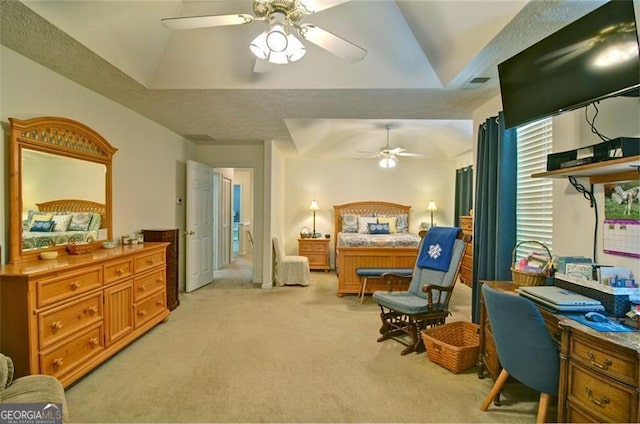 809 Longbranch Ln, Douglasville, GA 30134 - bedroom featuring light carpet, a desk, a tray ceiling, lofted ceiling, and a ceiling fan