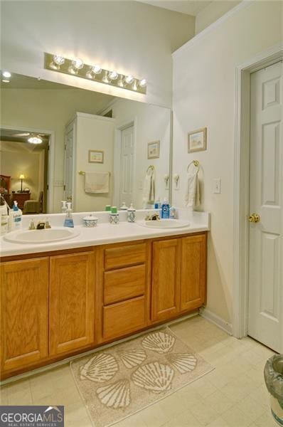 809 Longbranch Ln, Douglasville, GA 30134 - full bathroom with double vanity and tile patterned floors