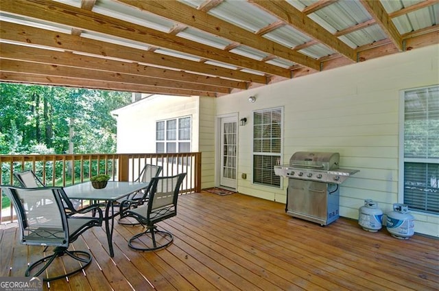 809 Longbranch Ln, Douglasville, GA 30134 - wooden terrace with a grill and outdoor dining space