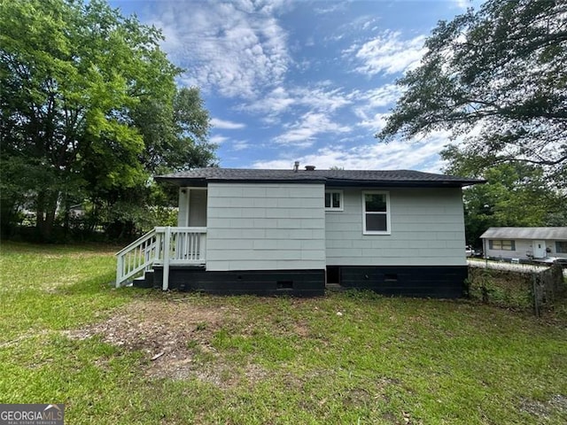 3005 Margaret Dr, Macon, GA 31206 - back of property with a yard and crawl space