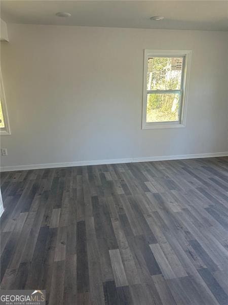 3005 Margaret Dr, Macon, GA 31206 - empty room with baseboards and dark wood-style floors