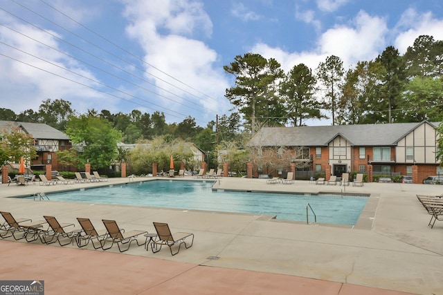 6851 Roswell Rd Unit E4, Sandy Springs, GA 30328 - community pool featuring a patio area