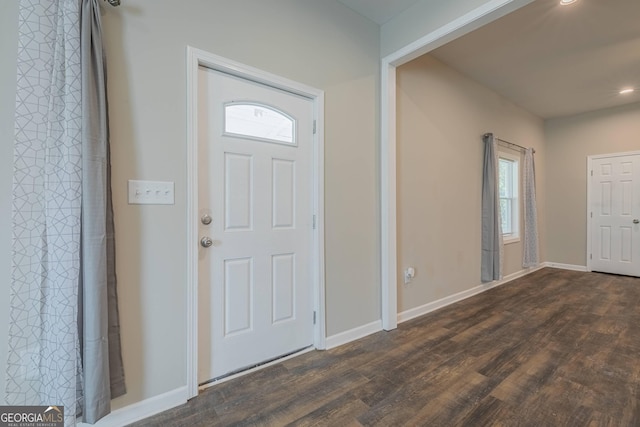 3107 Hendrix Cir SW, Covington, GA 30014 - entryway featuring plenty of natural light, dark wood finished floors, baseboards, and recessed lighting