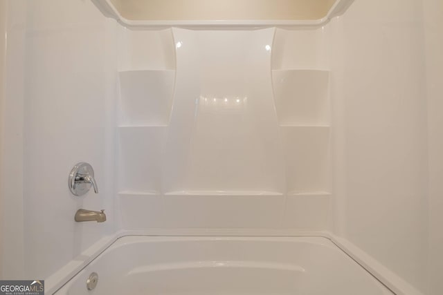 3107 Hendrix Cir SW, Covington, GA 30014 - bathroom featuring shower / tub combination